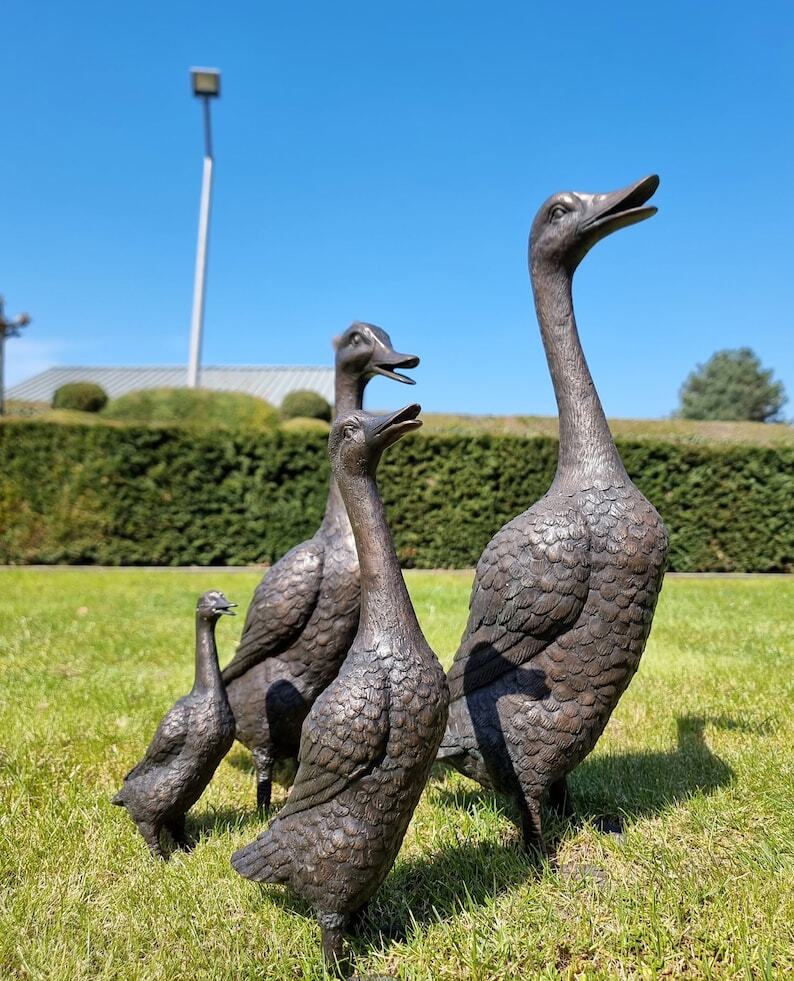 A duck family - group of bronze ducks - runner ducks - Bronze garden sculptures - bronze geese - pond decoration