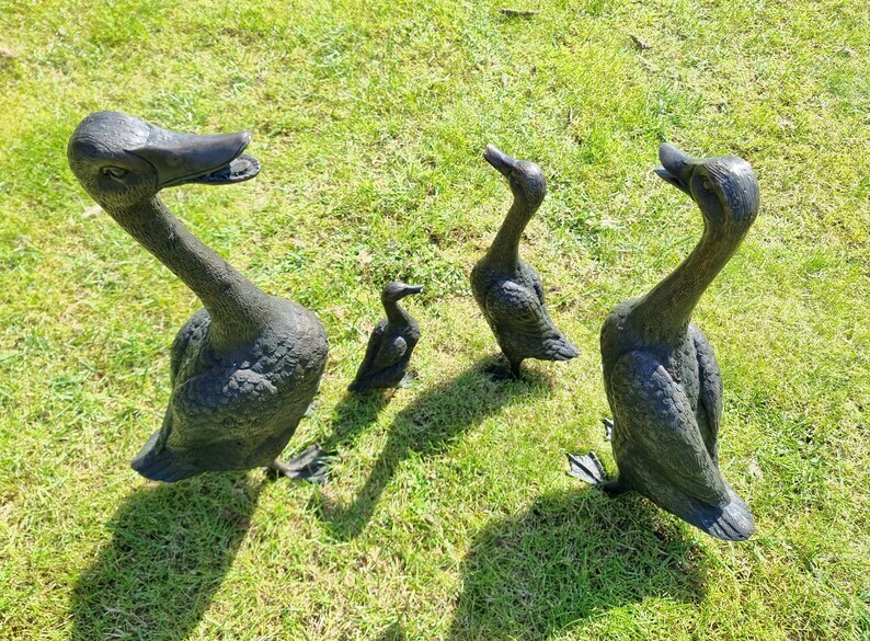 A duck family - group of bronze ducks - runner ducks - Bronze garden sculptures - bronze geese - pond decoration