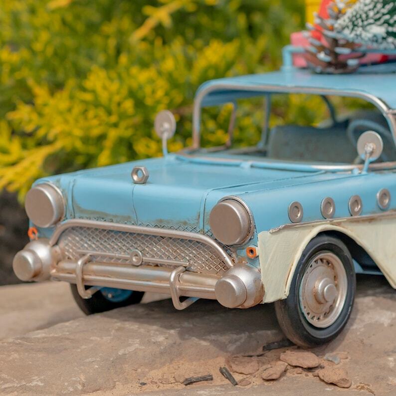 Vintage Style Automobiles with Christmas Trees and Gifts