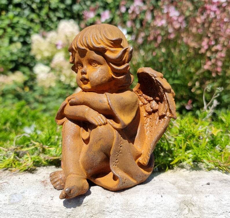 Pair of seated angels in cast iron - garden decoration - Angels