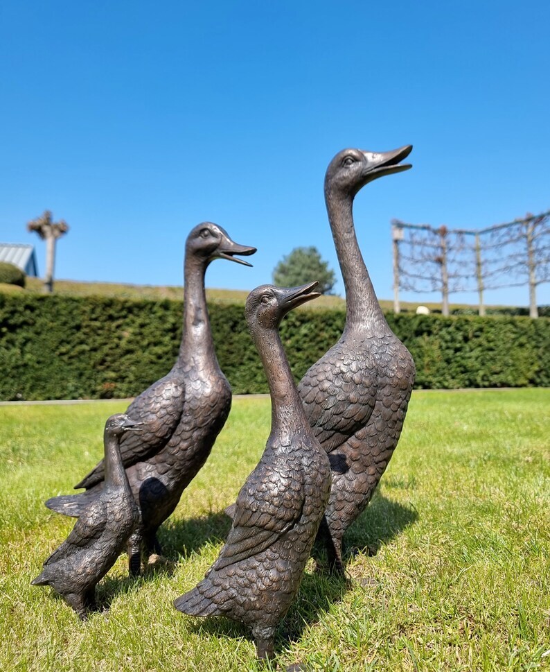 A duck family - group of bronze ducks - runner ducks - Bronze garden sculptures - bronze geese - pond decoration